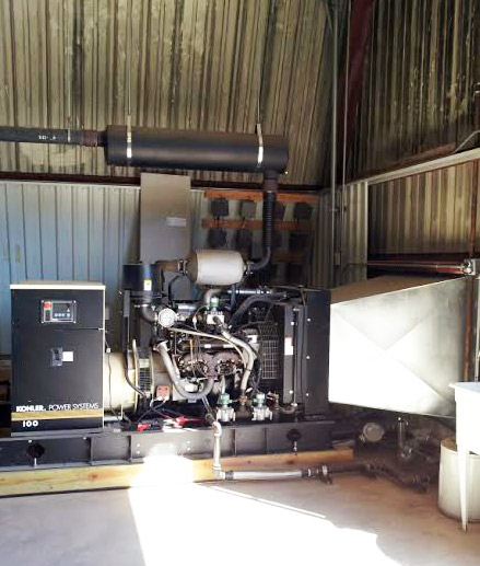 A 100 KW emergency backup generator installed in a barn in Parker, TX.